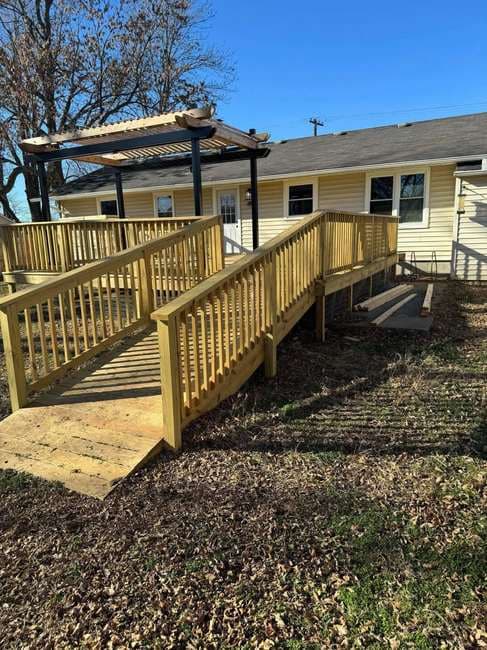 Custom deck, ramp, and pergola built by KB Pipe Fence & Fabrication